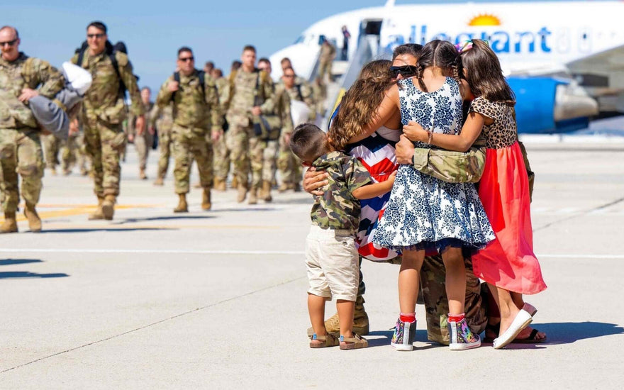 Military families reunite with deployed parents at the airport, showcasing love and support during homecoming.