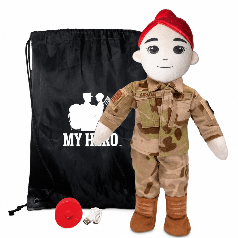 Air Force Push Doll dressed in a tan camouflage military uniform with a red beret, standing next to a black drawstring bag with a white 'MY HERO' logo, on a white background.