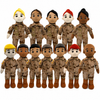Twelve military-themed plush dolls arranged in two rows against a plain white background. The dolls feature diverse skin tones, hair colors, and desert camouflage uniforms with brown boots.