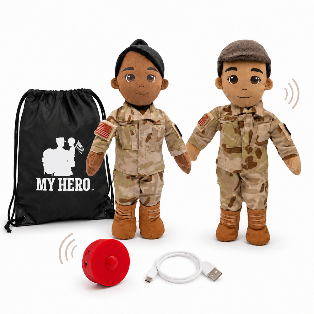 Air Force Daddy Doll in OCP uniform with recordable voice box, military doll design, and Airman doll details plush dolls in desert camouflage uniforms, shown with a black drawstring bag printed with 'MY HERO.' and a red remote control, on a white background.