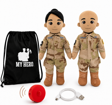 Daddy Doll Space Force military-themed plush dolls holding hands, shown with a black drawstring bag, a red alarm clock, and a white charging cable on a white background. The bag features a white graphic of a soldier and the text 'MY HERO.