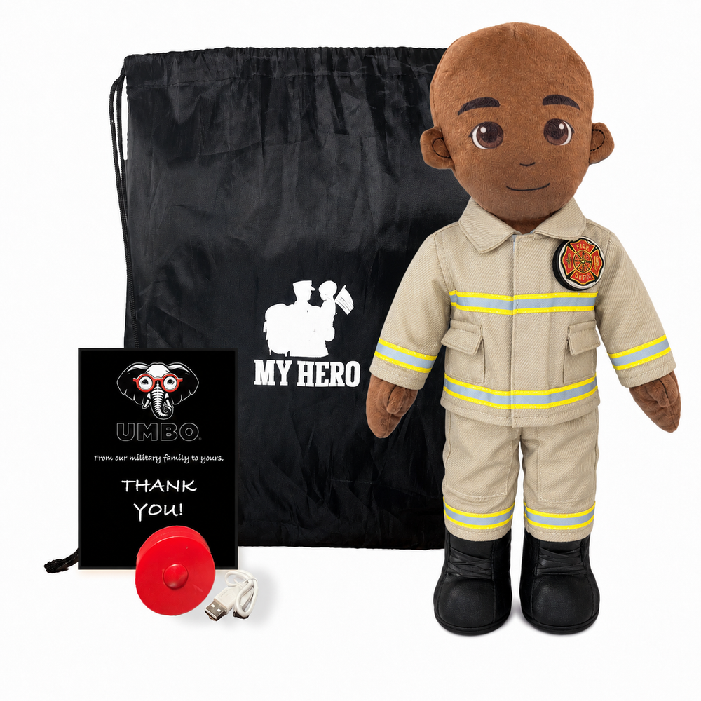 A firefighter-themed plush doll stands next to a black drawstring bag, a black gift card, and a red fire alarm on a white background. The doll wears a tan firefighter uniform with yellow stripes and black boots.