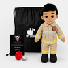 Firefighter stuffed animal in turn out gear with black hair tan skin 