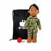 Marine Doll Dark Skin Black Hair Female Doll standing next to a black drawstring My Hero Backpack with white My Hero Logo and a small red Recorder on a white background.