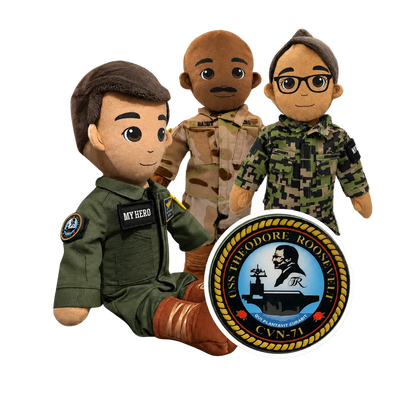 Pilot Daddy Doll sitting in front of a Custom USS THEODORE ROOSEVELT PTCH with marine and Army Daddy Doll in background. 