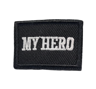 My Hero logo replacement patch in black with white font, hook backing accessory for compatible My Hero Doll uniforms and doll clothing.