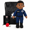 EMT Doll with dark skin and black hair, male paramedic in a blue emergency responder uniform with black boots beside a black My Hero backpack, recorder, charger and accessories on a white background.