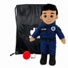 Paramedic Plush with tan skin and black hair, male EMT doll wearing a blue emergency responder uniform with black boots beside a black My Hero drawstring backpack, recorder and accessories on a white background.