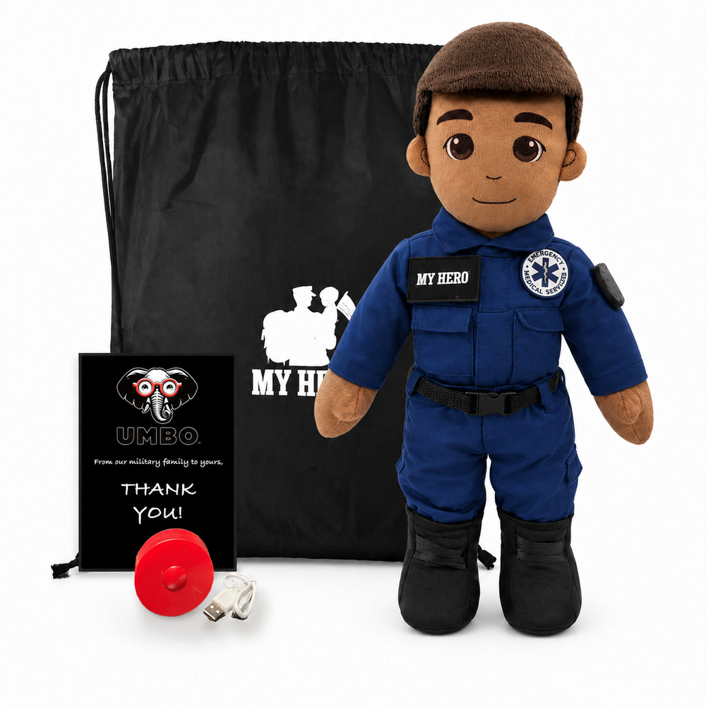 EMT Doll with tan skin and brown hair, male paramedic plush wearing a blue emergency responder uniform with black boots beside a black My Hero backpack, recorder, charger and accessories on a white background.
