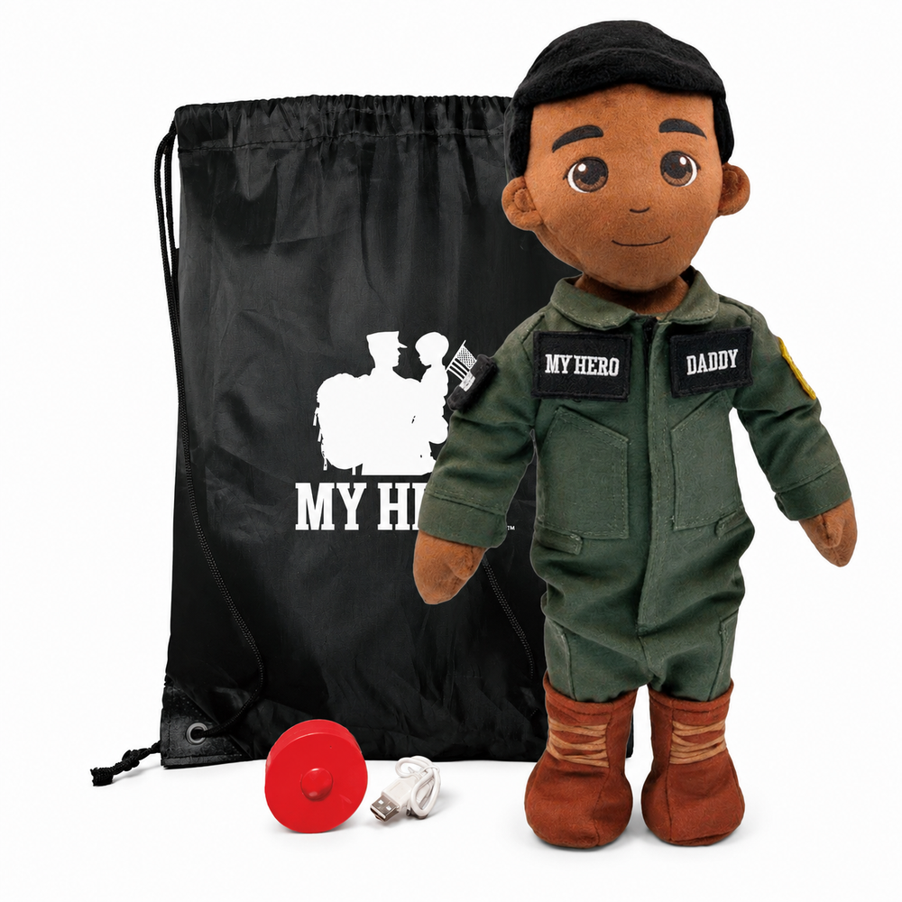 Pilot Daddy Doll Fair Skin Blonde Hair Male Doll with Flight Suit, My Hero Backpack, Recorder and Charger. A plush doll dressed in an olive green jumpsuit with 'MY HERO DADDY' patches, a black beret, and brown boots, shown with a black drawstring bag and a red cap on a white background.