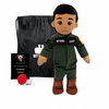 Pilot Daddy Doll Tan Skin Black Hair Male Doll with Flight Suit, My Hero Backpack, Recorder and Charger A personalized plush toy soldier dressed in a green military jumpsuit with 'MY HERO DADDY' embroidered on the chest, standing in front of a black drawstring bag, a small black plaque, and a red ball accessory on a white background.