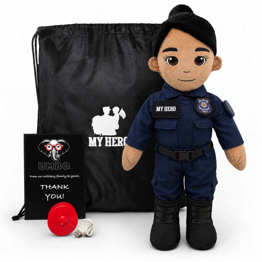 A custom police plush doll named 'UMBO' in a navy blue police uniform with 'MY HERO' patches, displayed alongside a black drawstring bag, a black gift card, and a small red weight on a white background.