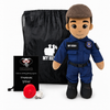 A custom police stuffed animal dressed in a blue uniform and brown beret, displayed alongside a black drawstring bag, a black personalized thank you card, and a red whistle on a white background