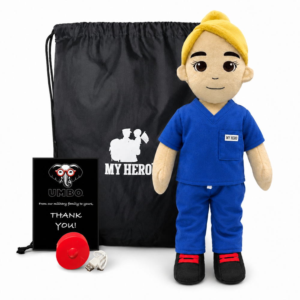 Doctor doll in blue medical scrubs with fair skin and blonde hair, female recordable healthcare doll. A plush doctor doll with blonde hair, wearing a blue scrubs outfit and black shoes with red accents, displayed alongside a black drawstring bag, a small red toy, and a black card that reads 'MY HERO UMBQ' on a white background.
