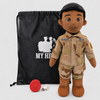 Space Force Doll Recordable Doll, Dark Skin with Black Hair, custom plush doll of a male soldier in OCP uniform standing next to My Hero Backpack, recording device and charger.