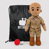 Space Force Doll Recordable Doll, Tan Skin and Bald, custom plush doll of a male soldier in OCP uniform standing next to My Hero Backpack, recording device and charger.