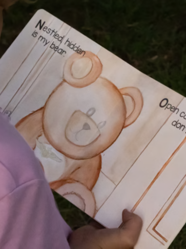 child reading military book about PCS