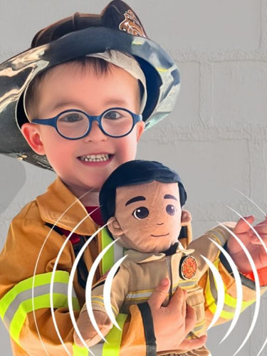 daddy doll firefighter with audio noise being held by child in firefighter uniform
