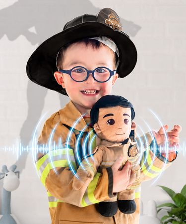 Daddy Doll firefighter doll customizable doll military dolls photo of a young child dressed as a firefighter holding a plush firefighter Daddy Doll with bright blue sound wave effects across the doll’s chest to show it is recordable, making this a meaningful customizable doll for kids who want a comforting hero themed keepsake with a personal voice message.