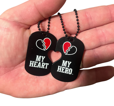 holding dog tag set for military family
