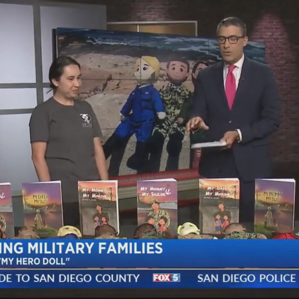 Custom grandparent dolls: medium skin, auburn hair grandparent figure wearing "My Hero" tee and branded shoes.